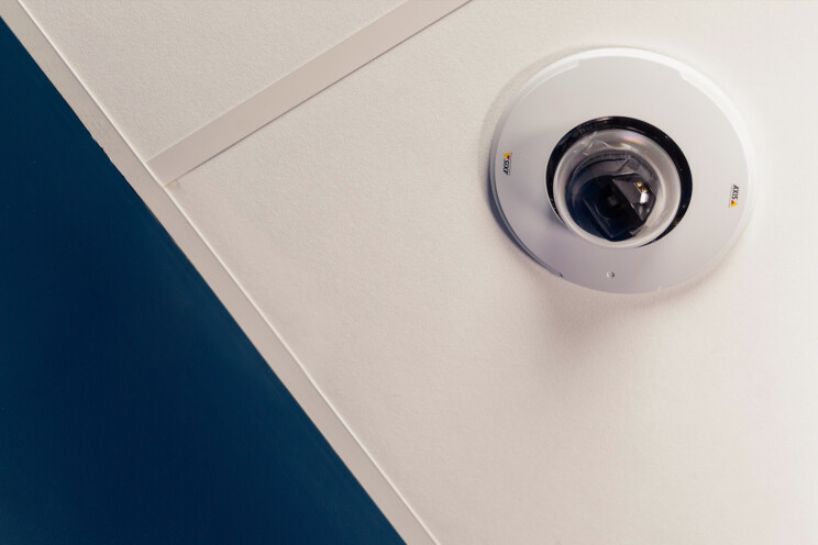 Close up of CCTV dome camera installed on a ceiling
