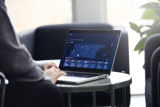 Securitas employee looking at digital dashboard in the workplace