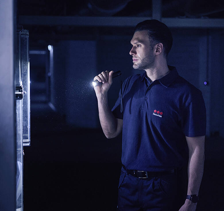 Securitas Ireland security officer performing a routine site patrol.