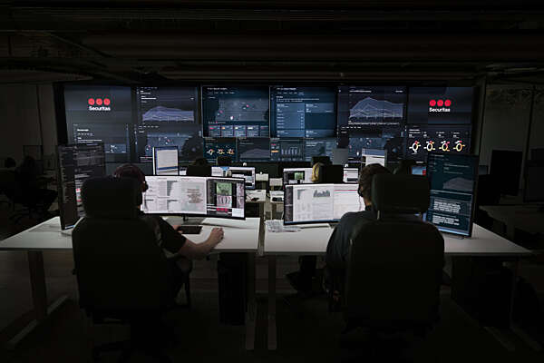 Securitas security specialists remotely monitoring CCTV and alarms in a security operations centre