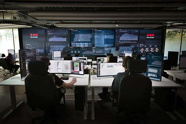 An operations center at Securitas where analysts prepare crisis and emergency reports  for clients.