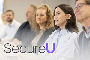 Securitas employees in conference room.