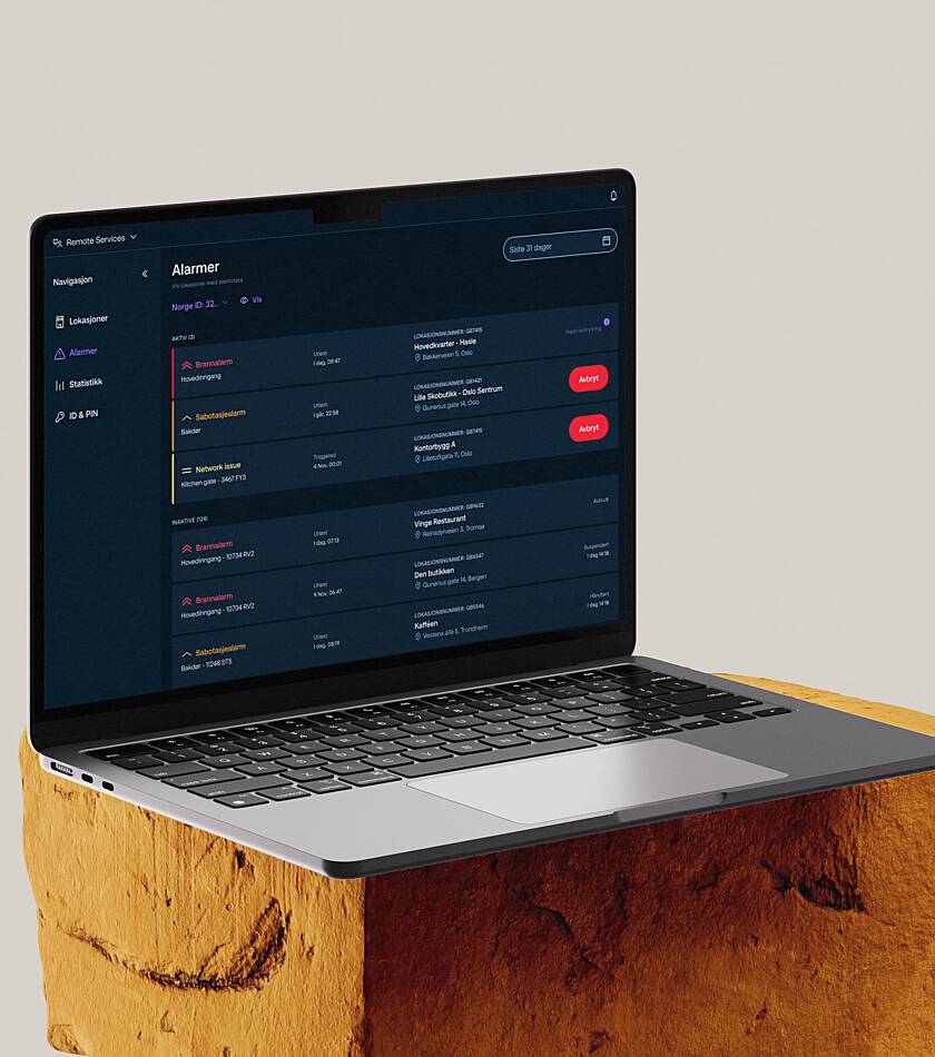 A macbook showing an alarm overview in Securitas' security and customer portal MySecuritas