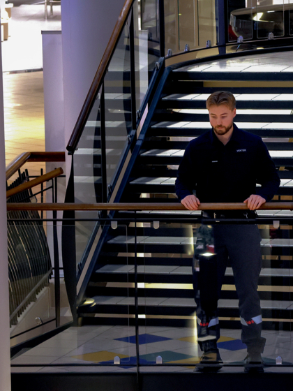 Securitas guard patrolling a shopping center.
